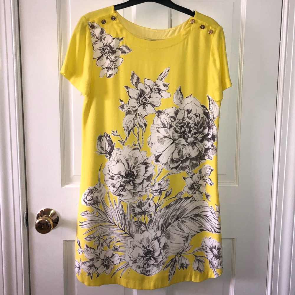 Yellow dress with black and white flowers